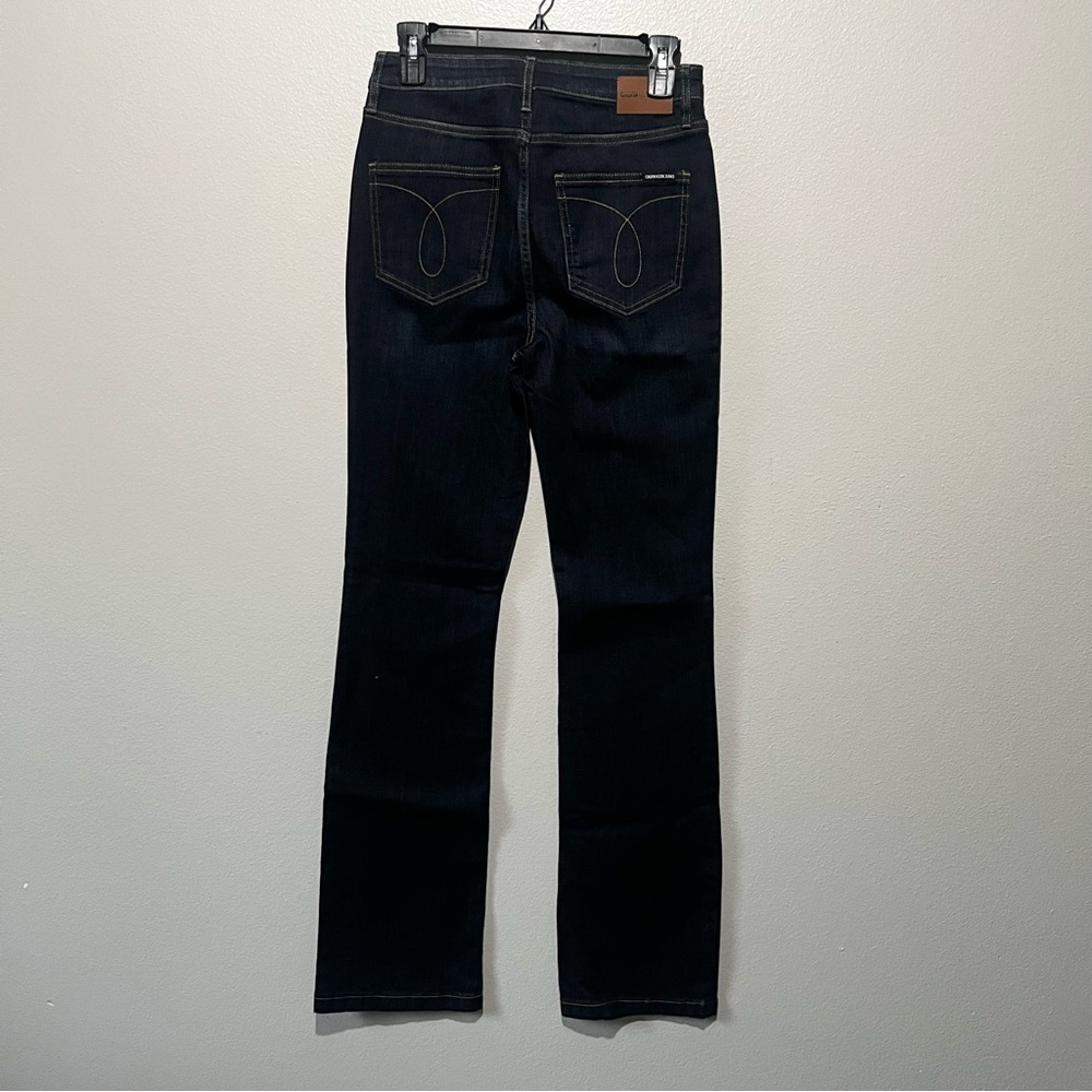 CALVIN KLEIN-NWT Dark Blue High Rise Bootcut Jeans Size 28 - Picture 2 of 7